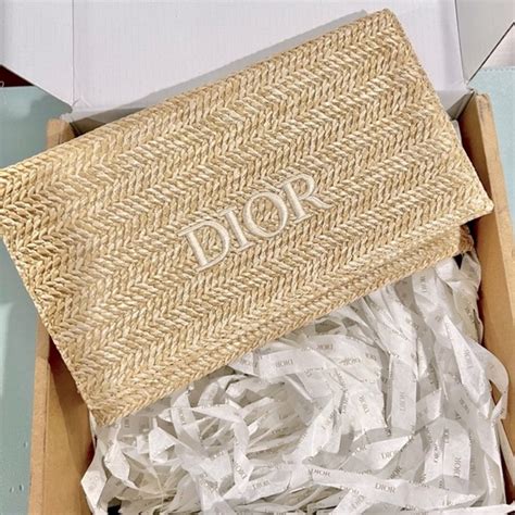 dior rafia pouch|Dior raffia clutch bag.